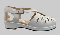 White sandal with cut-out design on a blank background